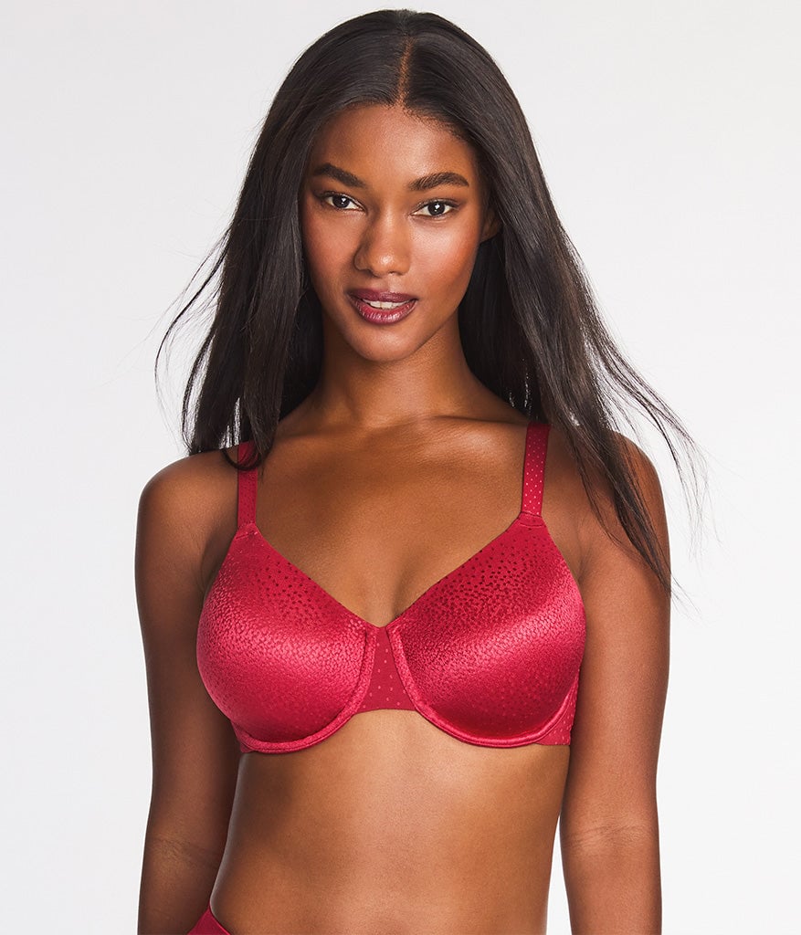 Woman with long dark hair wearing a red textured underwire bra, front view